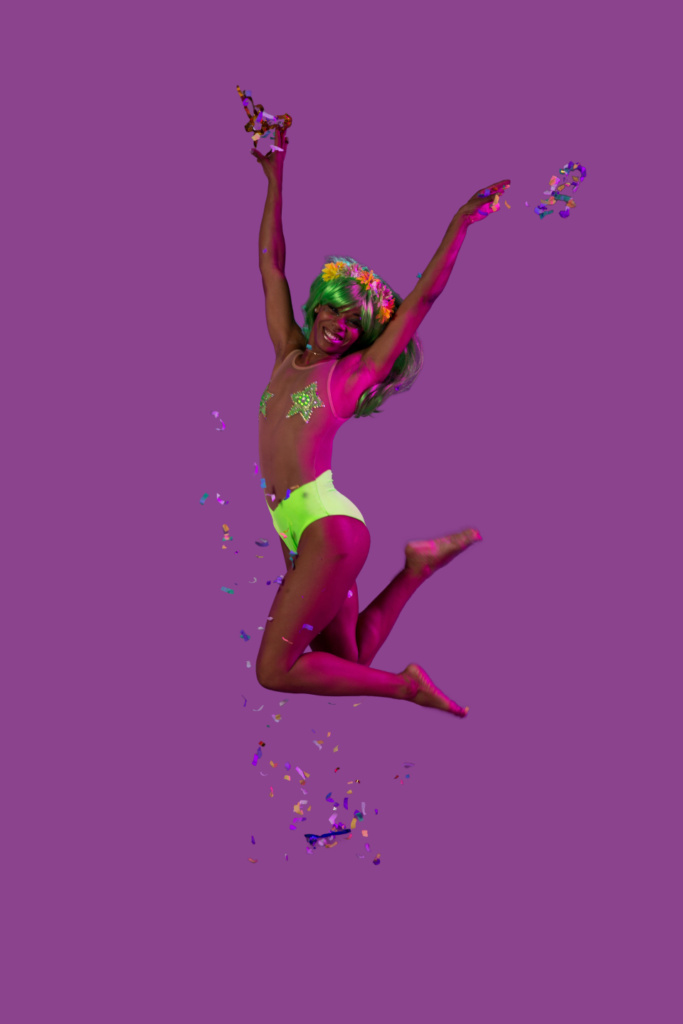 EDM Girl Jumping with Confetti